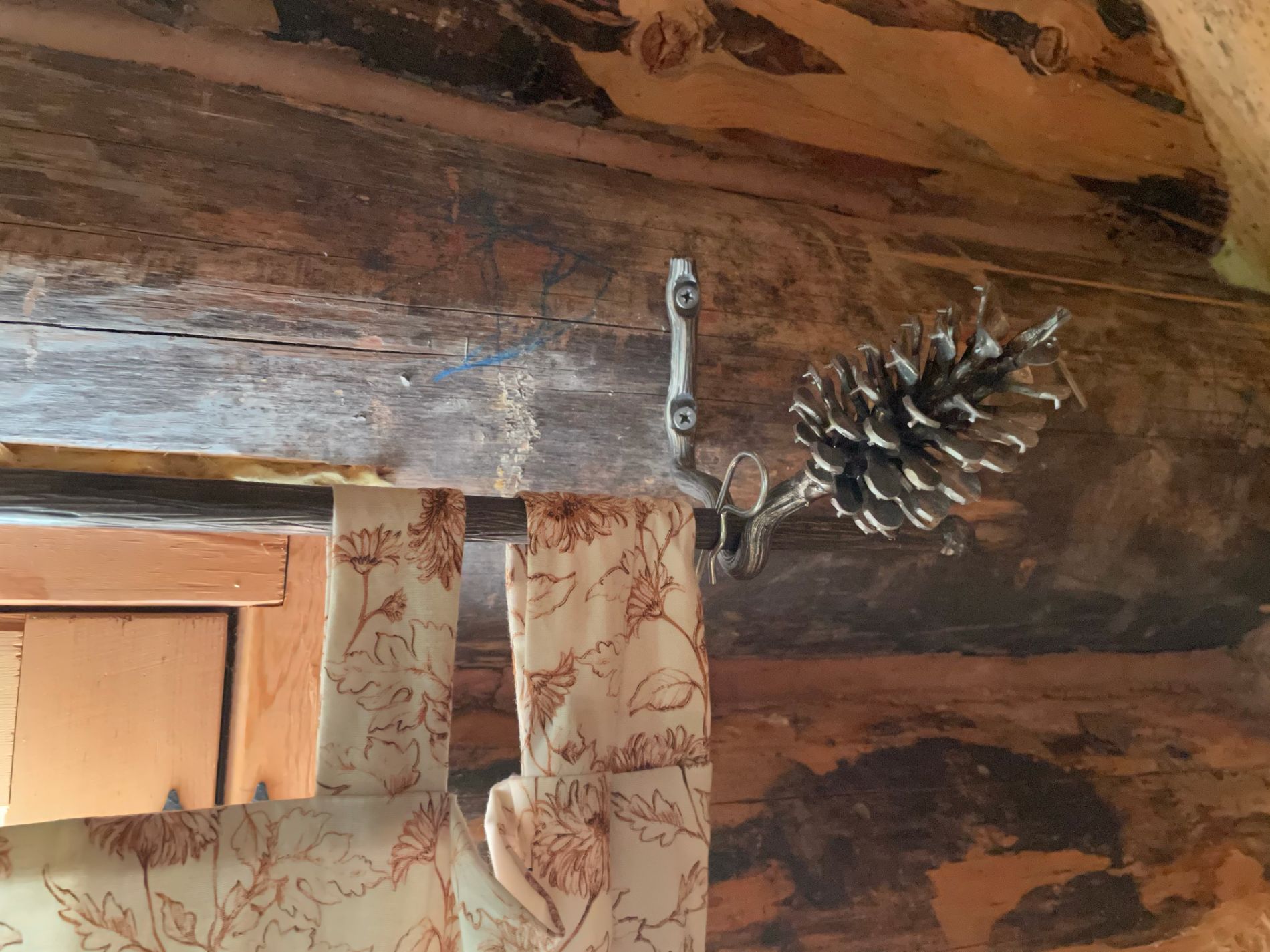 Close-up of hand-forged curtain rod