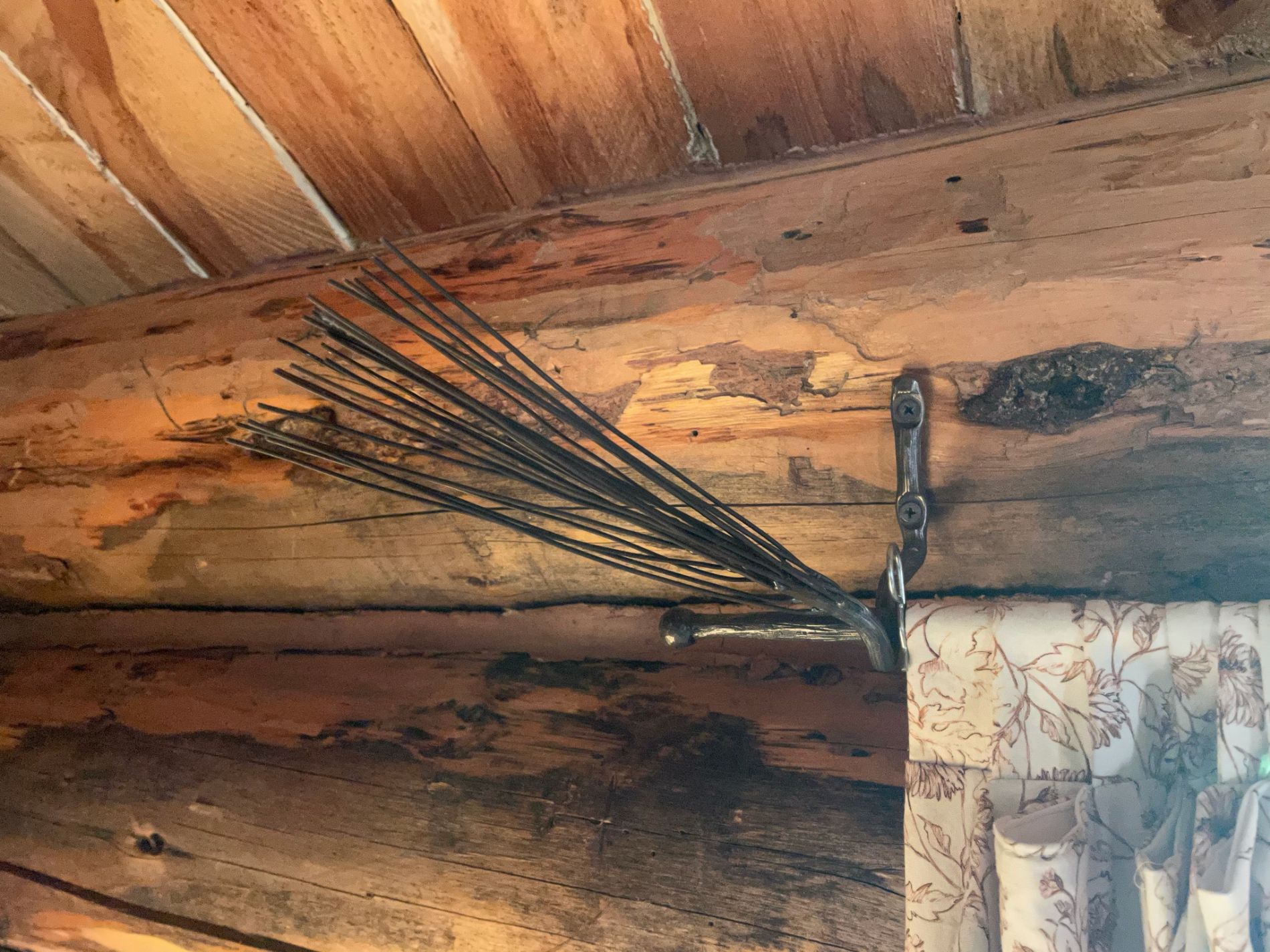 Close-up of hand-forged curtain rod